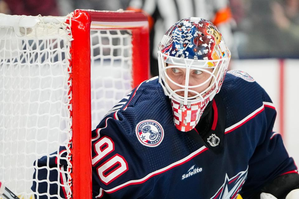Nov 16, 2023; Columbus, Ohio, USA; Columbus Blue Jackets goaltender Elvis Merzlikins (90) watches from the net during the second period of the NHL hockey game against the Arizona Coyotes at Nationwide Arena.