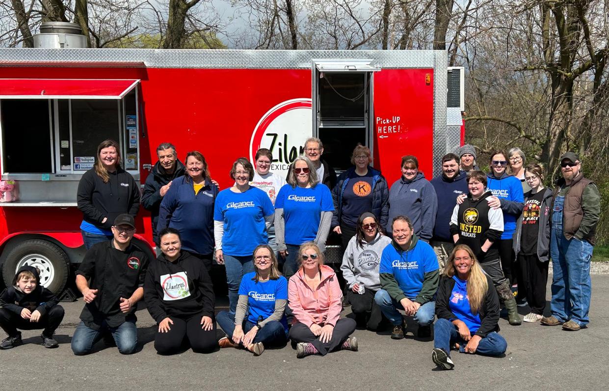 Some of the close to 30 volunteers who participated in the litter removal project on the Kiwanis Trail enjoyed taco lunches provided by Gleaners Legacy Arbor.