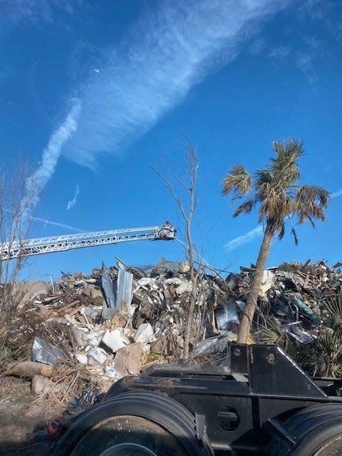 The Sanibel Police and Fire Departments responded to a fire in the debris pile on Island Inn Road Friday morning at approximately 6:00 a.m.