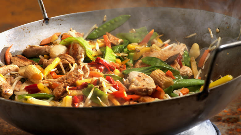 Chicken stir fry in a wok