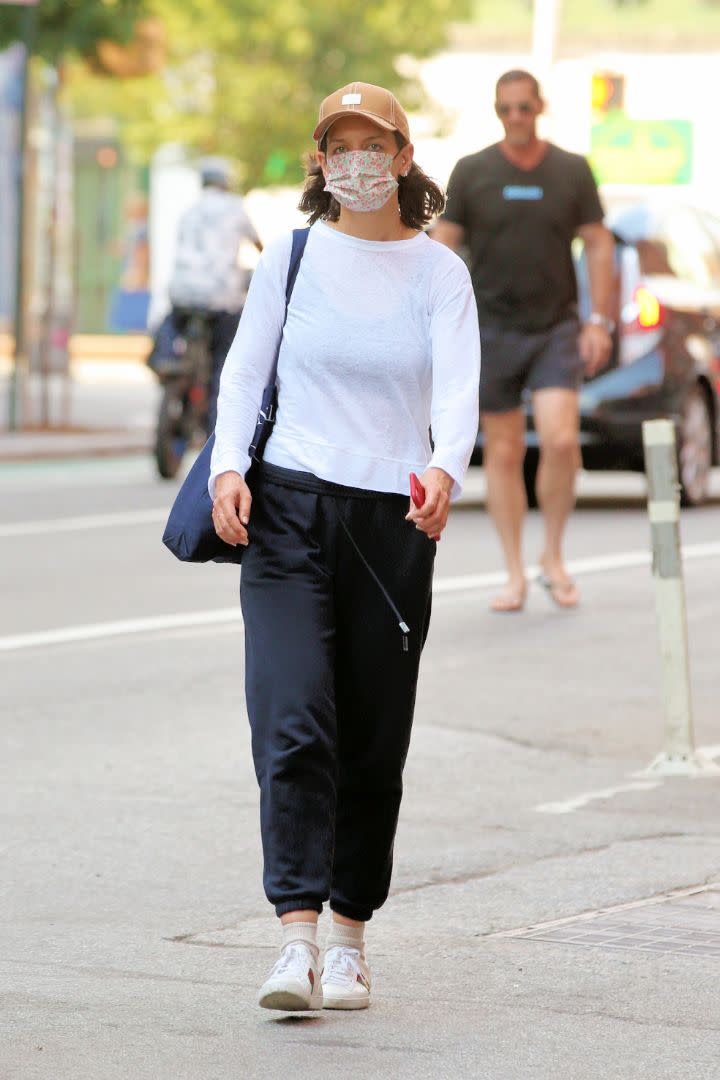 Katie Holmes returns a Citi Bike after a ride in New York City, June 29. - Credit: Christopher Peterson/Splash News