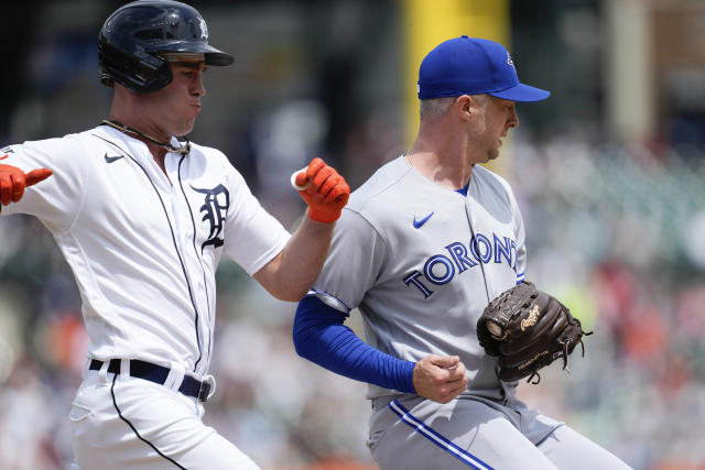 Toronto Blue Jays first baseman Matt Stairs, right, can't handle