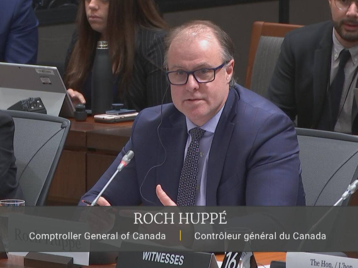 Roch Huppé, comptroller general of Canada, testifies before a House of Commons committee examining government contracts awarded to McKinsey & Company on Wednesday. (CBC News/Radio Canada - image credit)