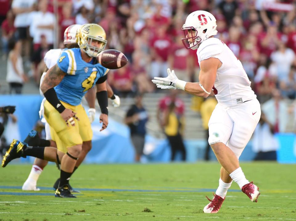 Christian McCaffrey and Stanford travel to Washington on Friday (Getty). 