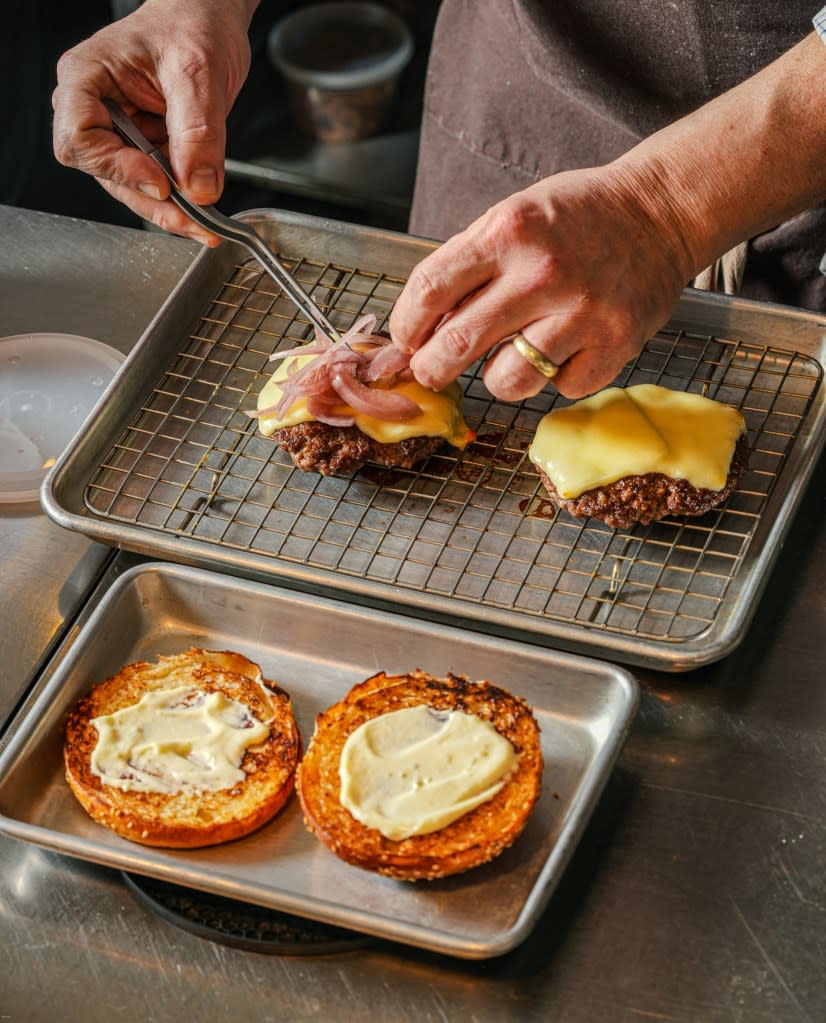 Philadelphia chef Randy Rucker assembles his sublime cheeseburger at River Twice.