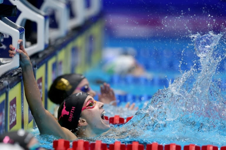 Regan Smith celebrates her world record to win the 100m backstroke at the US Olympic swimming trials (AL BELLO)