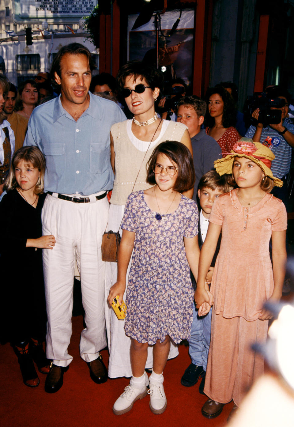 Kevin with his young family on the red carpet