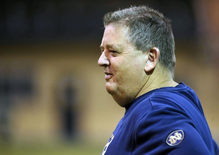 Charlie Weis was paid nearly $19 million by Notre Dame after getting fired. (AP)