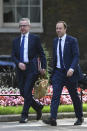 Britain's Environment Secretary Michael Gove, left, and Health Secretary Matt Hancock arrive for a cabinet meeting at 10 Downing Street, London, Tuesday June 18, 2019. (Stefan Rousseau/PA via AP)