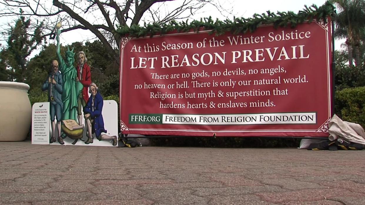 The Freedom From Religion Foundation set up an anti-religion sign alongside the Christmas display in a park in San Diego. (Photo: Twitter/10NewsAarons)