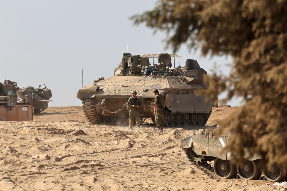 Israeli tanks are deployed on the border with Gaza in southern Israel on Nov. 5, 2023.