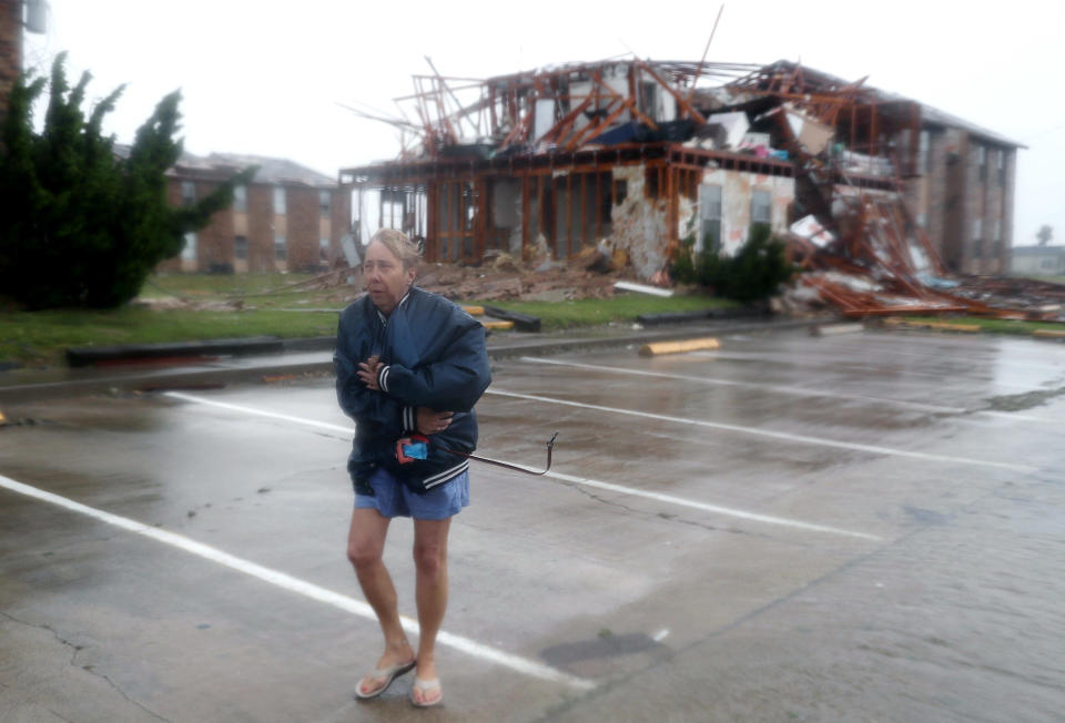 Jacque McKay walks through the apartment complex where she lives in Rockport.