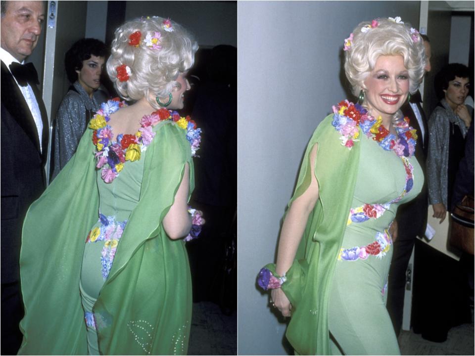 Side-by-side photos of the back and front of Dolly Parton's green dress embellished with flowers and with flowers in her hair.