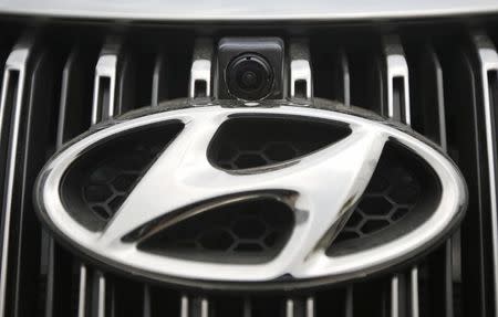 A vehicle camera is installed on the front grill of a Hyundai Motors' Grandeur sedan at Hyundai Mobis Research Centre in Yongin, in this file photo taken July 16, 2014. REUTERS/Kim Hong-Ji