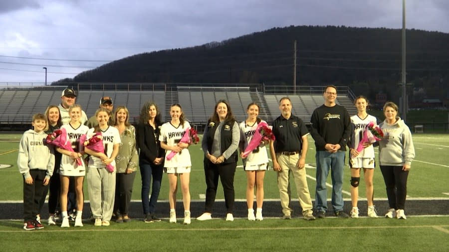 <em>Corning girl’s lacrosse celebrated seniors; Makenna Morse, Courtney Castellana, Riley Dollard, Audrey Hart, and Paige Stansfield prior to their Thursday night game with Horseheads. </em>