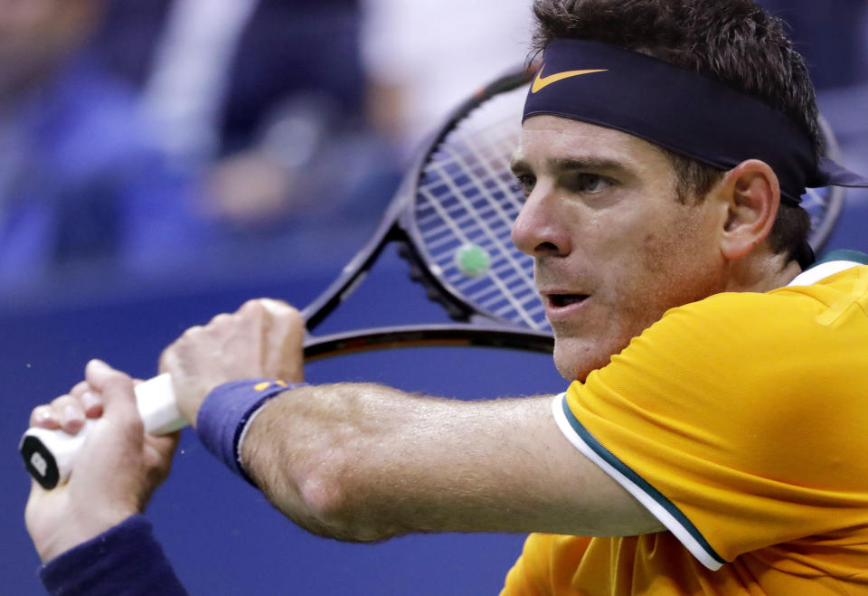 Juan Martin del Potro, of Argentina, returns a shot to Rafael Nadal, of Spain, during the semifinals of the U.S. Open tennis tournament, Friday, Sept. 7, 2018, in New York. (AP Photo/Seth Wenig)