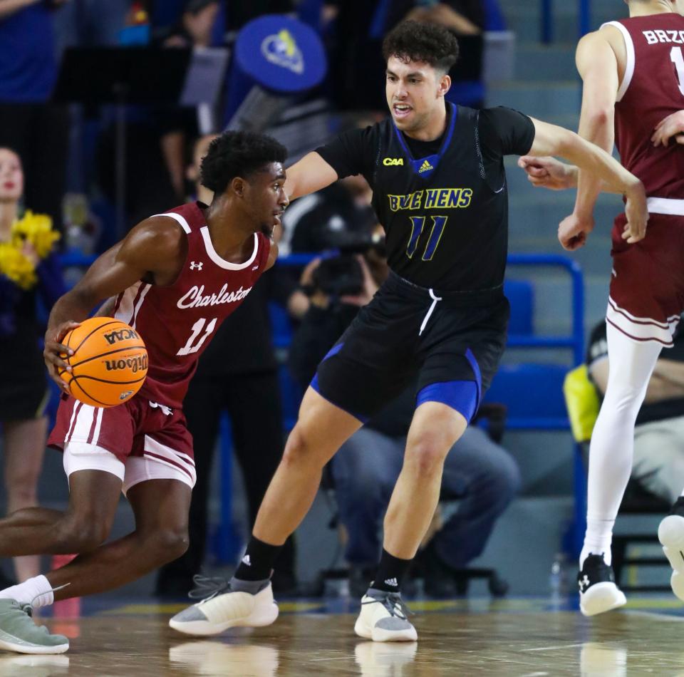 Delaware's Kobe Jerome works on defense against Charleston's Kobe Rodgers in the second half of Delaware's 90-71 loss at the Bob Carpenter Center, Thursday, Feb. 22, 2024.