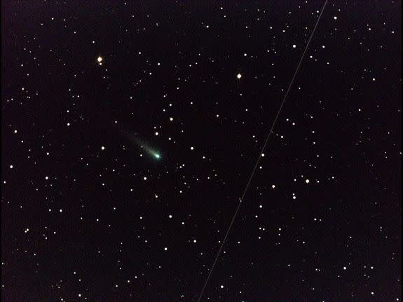 In the early morning of Oct. 25, 2013, NASA's Marshall Space Flight Center in Huntsville, Ala., used a 14" telescope to capture this image of Comet ISON (the greenish object just left of center) cruising through the constellation of Leo the Lio