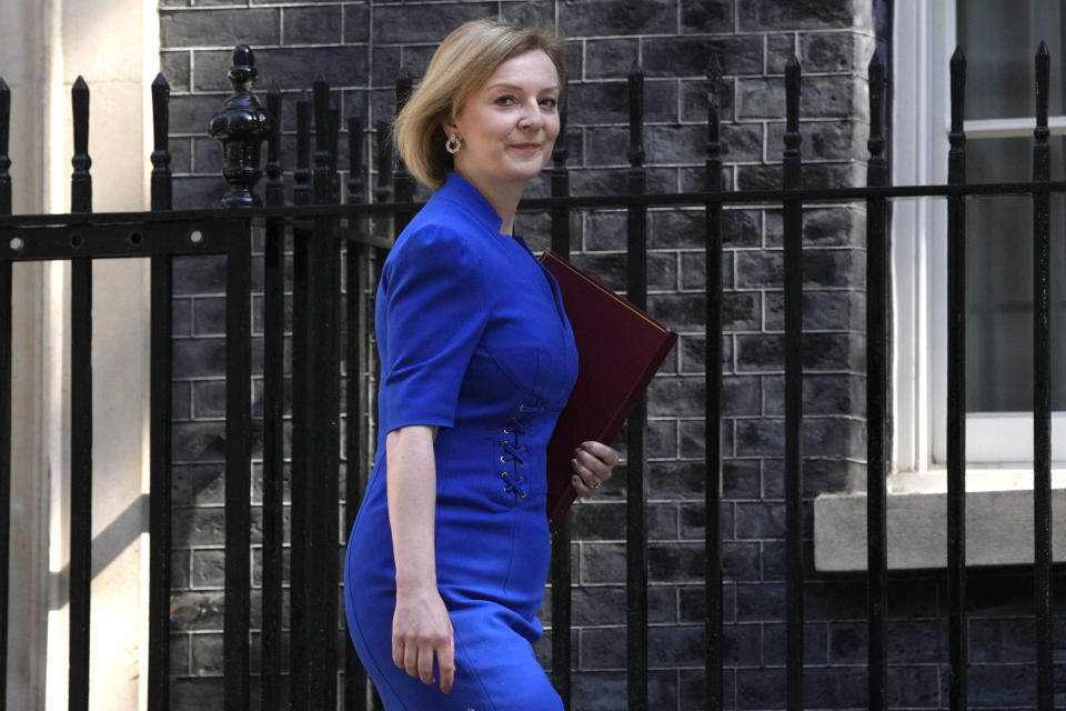 FILE - Britain's Foreign Secretary Elizabeth Truss arrives for a cabinet meeting at 10 Downing Street in London, Tuesday, June 7, 2022. British Prime Minister Boris Johnson managed to see off a no-confidence vote from his own Conservative Party — but the result dealt a heavy blow to his authority, and questions are already being asked over who could succeed him. (AP Photo/Kirsty Wigglesworth, File)