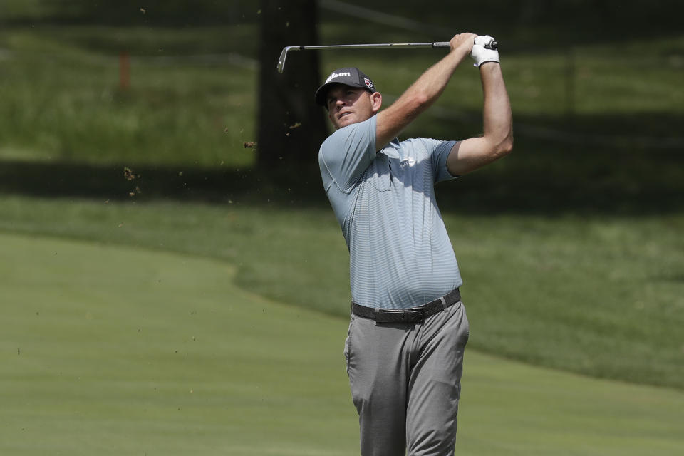 Brendan Steele hits from the 18th fairway during the first round of the Memorial golf tournament, Thursday, July 16, 2020, in Dublin, Ohio. (AP Photo/Darron Cummings)