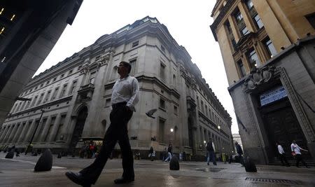 A man walks in Buenos Aires' financial district early August 1, 2014. REUTERS/Marcos Brindicci