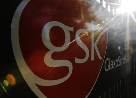 The signage for the GlaxoSmithKline building is pictured in Hounslow, west London June 18, 2013. REUTERS/Luke MacGregor