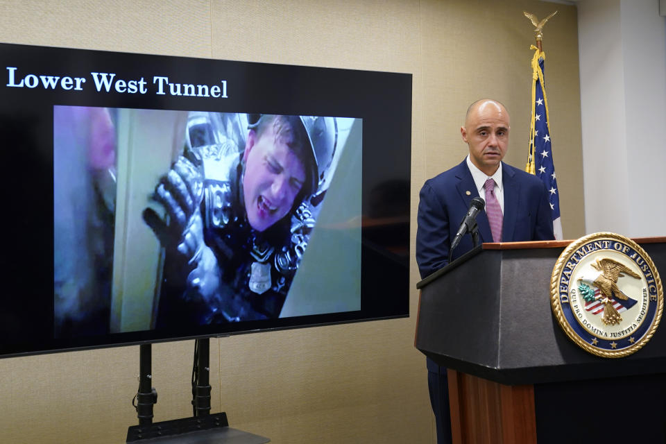 U.S. Attorney for the District of Colombia Matthew Graves speaks about the unfolding of the January 6 attack on the Capitol during a presentation ahead of this year's third anniversary in Washington, Thursday, Jan. 4, 2024. (AP Photo/Susan Walsh)