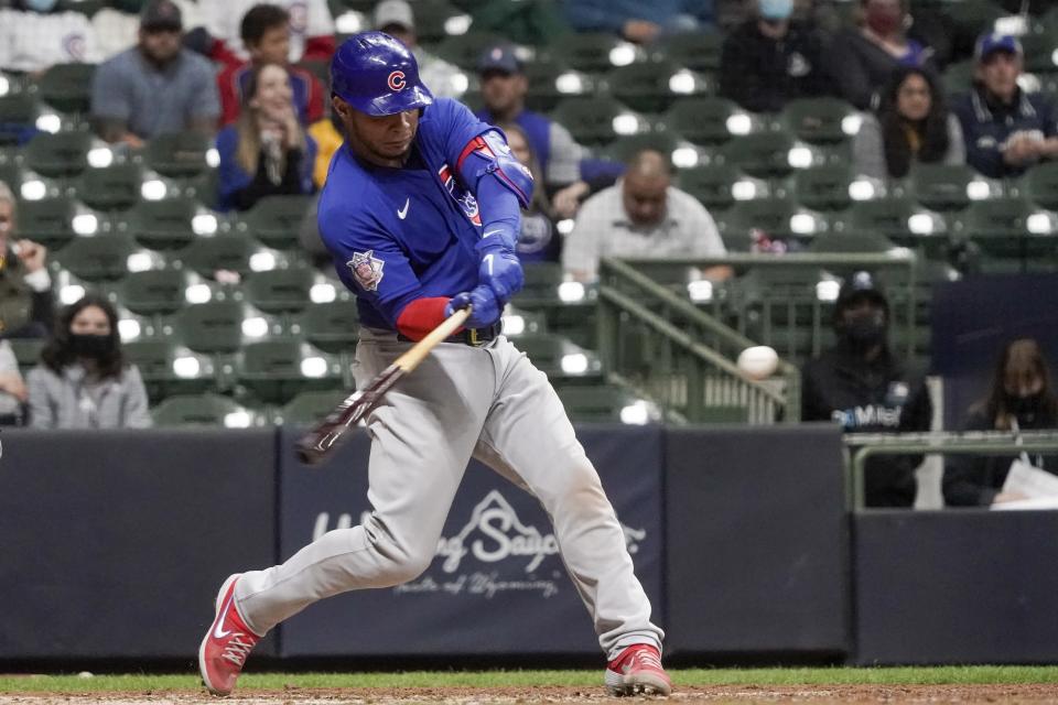 Chicago Cubs' Willson Contreras hits a two-run home run during the eighth inning of a baseball game against the Milwaukee Brewers Tuesday, April 13, 2021, in Milwaukee. (AP Photo/Morry Gash)