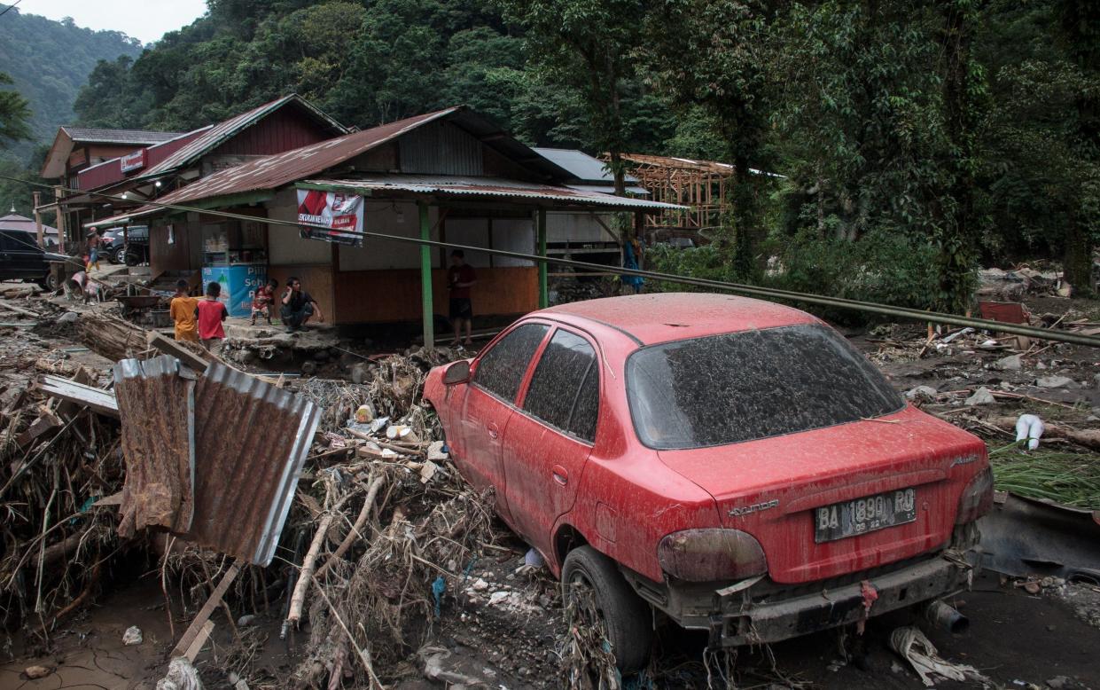 Mudslides and cold lava left a load of devastation in their wake in the Indonesian province of West Sumatra - Dozens killed by floods and cold lava mudslides in Indonesia