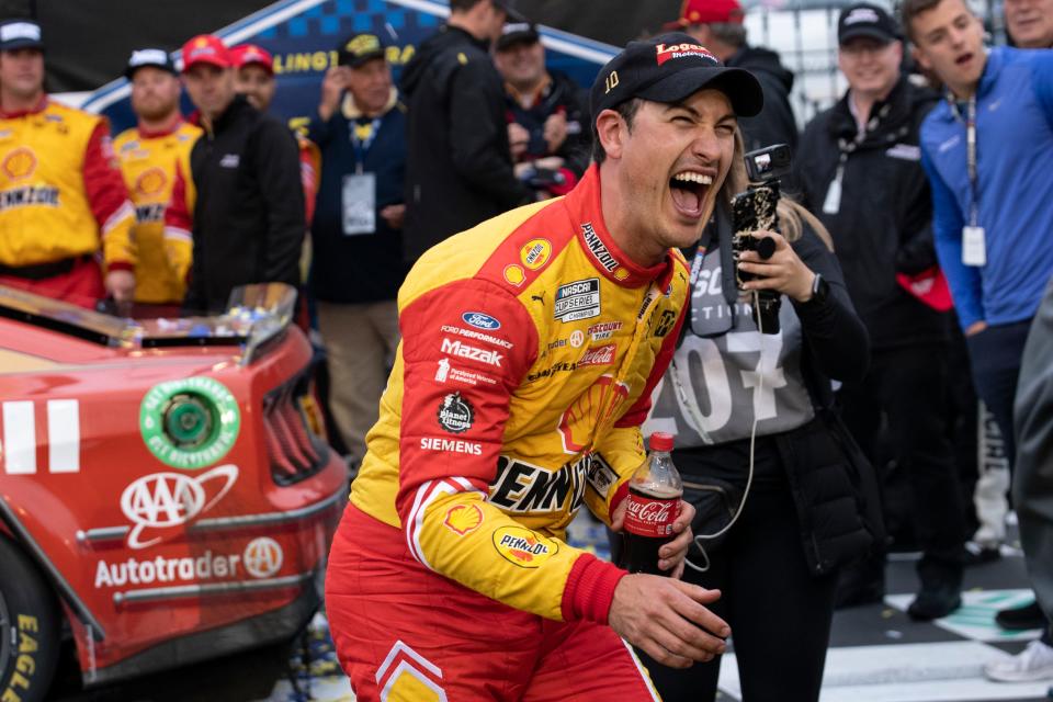 Joey Logano celebrates in Victory Lane after winning at Darlington last year, but he got there by admittedly wrecking William Byron. No penalty or fine was levied by NASCAR.