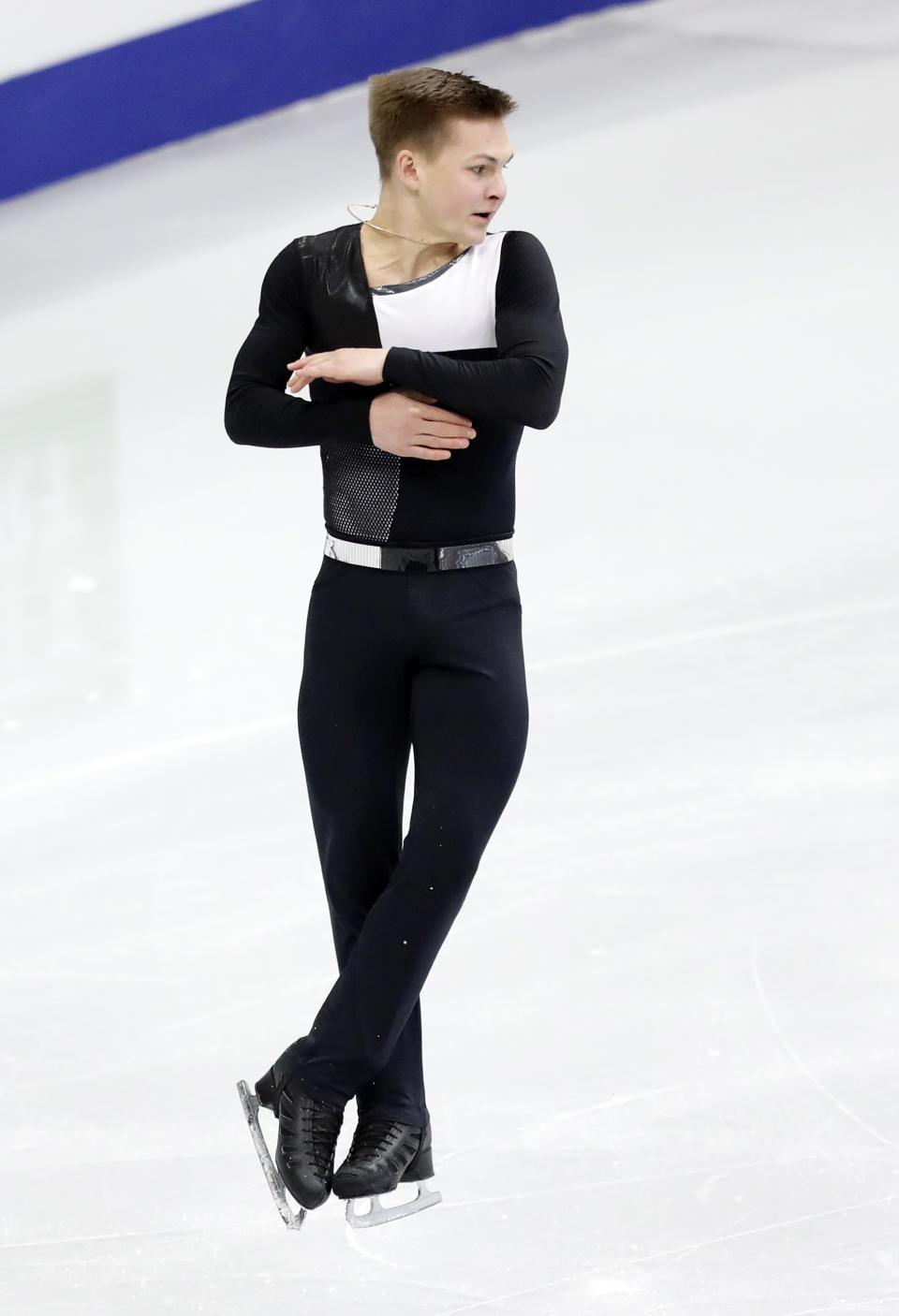 Russia's Mikhail Kolyada performs in the men's short program at the ISU European figure skating championships in Minsk, Belarus, Thursday, Jan. 24, 2019. (AP Photo/Sergei Grits)