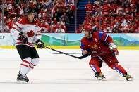 <p>Alexander Ovechkin #8 of Russia skates next to Sidney Crosby #87 of Canada in the third period during the ice hockey men’s quarter final game between Russia and Canada on day 13 of the Vancouver 2010 Winter Olympics at Canada Hockey Place on February 24, 2010 in Vancouver, Canada. (Photo by Bruce Bennett/Getty Images) </p>