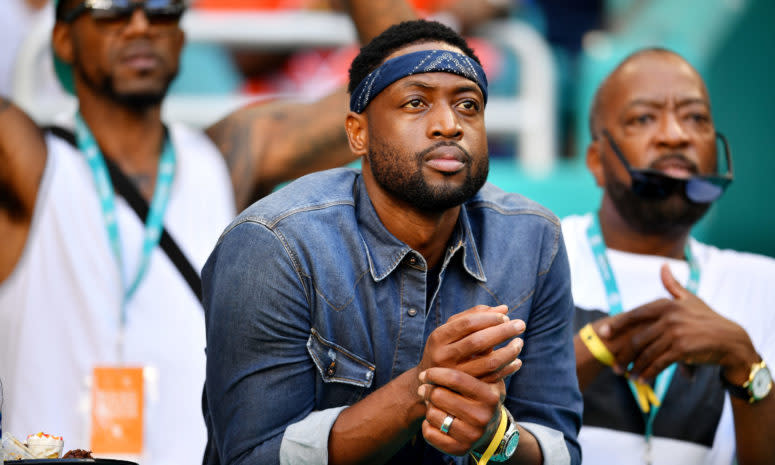 A closeup of Dwyane Wade attending an NFL game.