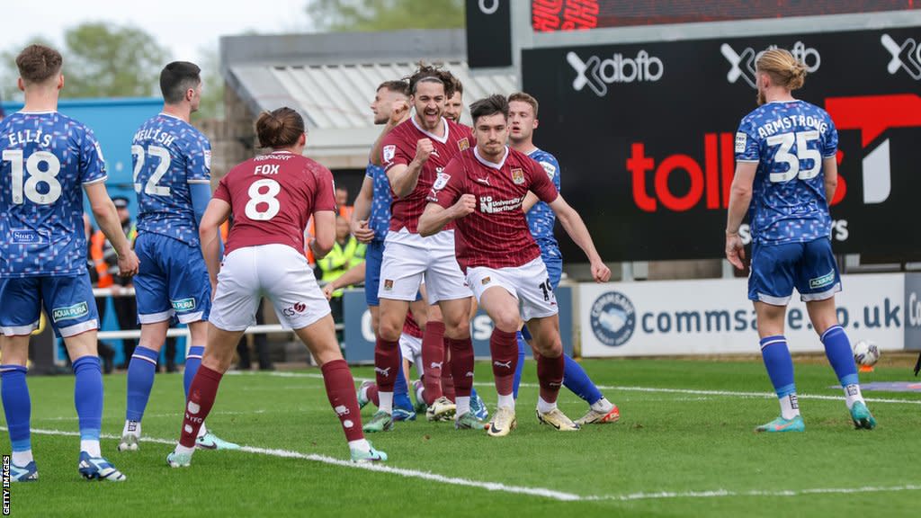 Kieron Bowie celebrates a Northampton goal against Carlisle