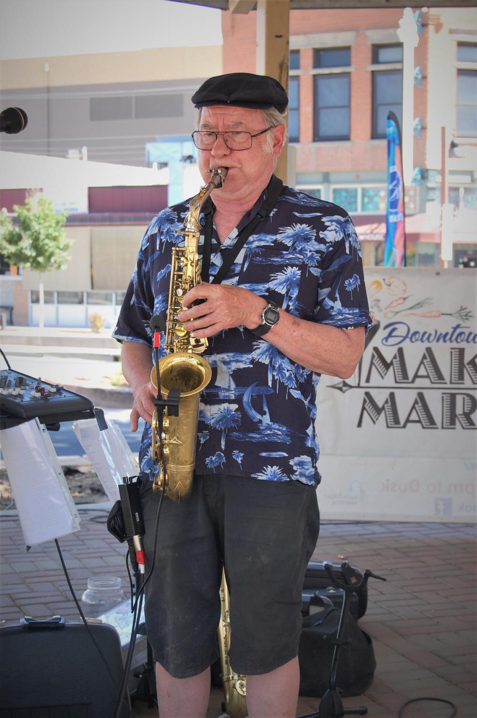 Saxophonist Mark Smith performs at Orchard Plaza during the Makers Market on June 2 in downtown Farmington.