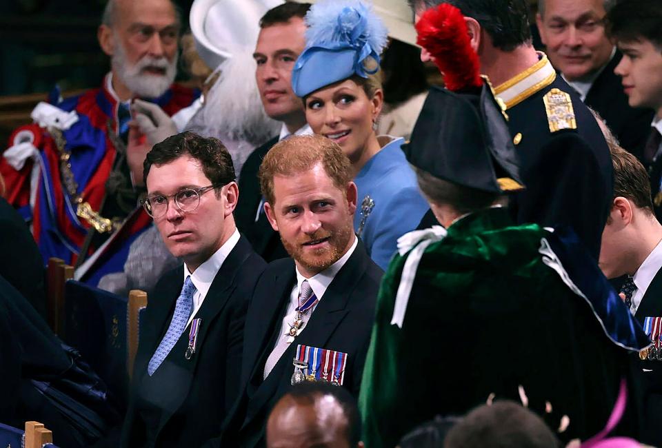 Prince Harry is shown at the coronation ceremonies of his father, King Charles III. Meghan Markle did not come to the event, and her husband Harry left shortly after it concluded.