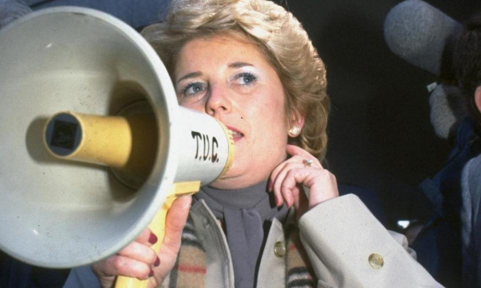 Brenda Dean, head of Print Workers Union Sogat 82, speaking into bullhorn during strike against newspaper owner Rupert Murdoch at TUC (Trades Union Congress) Building.