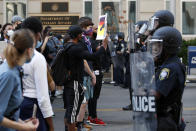 Demonstrators gather to protest the death of George Floyd, Tuesday, June 2, 2020, near the White House in Washington. Floyd died after being restrained by Minneapolis police officers. (AP Photo/Alex Brandon)