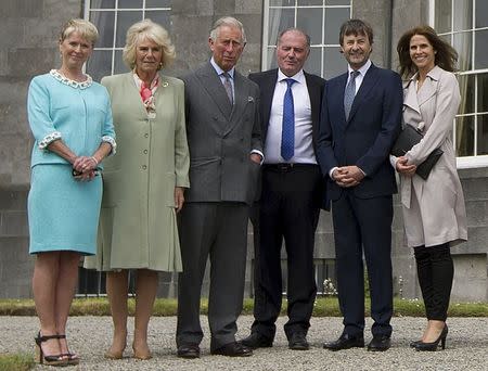 Britain's Prince Charles, Prince of Wales, and Camilla, Duchess of Cornwall, with owners Constance Cassidy and Eddie Walsh and family and friends including Timothy Knatchbull and wife Isabella, during a visit to Lissadell House May 20, 2015. REUTERS/Eddie Mulholland/Pool