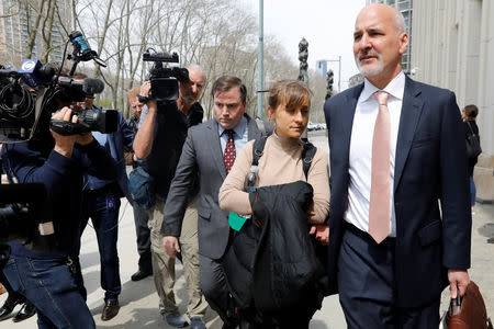 Actress Allison Mack departs the Brooklyn Federal Courthouse after facing charges regarding sex trafficking and racketeering related to the Nxivm cult case in New York, U.S., April 8, 2019. REUTERS/Shannon Stapleton