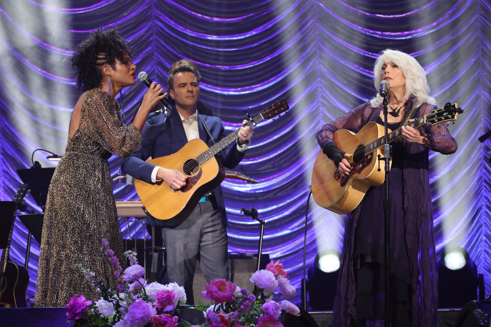 Allison Russell and Emmylou Harris perform onstage during CMT and Sandbox Live’s “Naomi Judd: A River Of Time Celebration” at Ryman Auditorium on May 15, 2022 in Nashville, Tennessee. - Credit: Jason Kempin for CMT