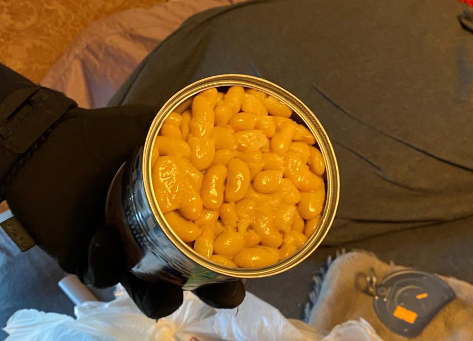 Photo from the Maine Drug Enforcement Agency shows a can of beans that investigators say contained hidden fentanyl.