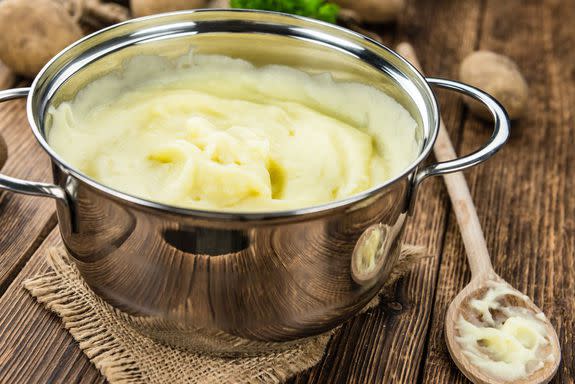 Potato Mash on rustic wooden background (close-up shot); Shutterstock ID 520682866