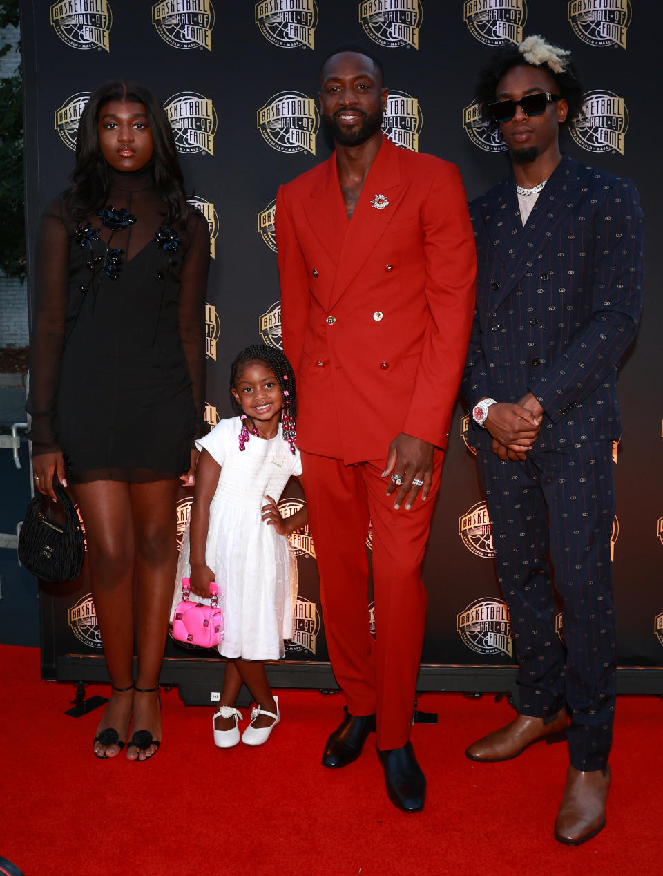 SPRINGFIELD, MASSACHUSETTS - AUGUST 12: Zaya Wade, Kaavia James Wade, 2023 inductee Dwyane Wade and Zaire Wade attend the 2023 Naismith Basketball Hall of Fame Induction at Symphony Hall on August 12, 2023 in Springfield, Massachusetts. (Photo by Mike Lawrie/Getty Images)