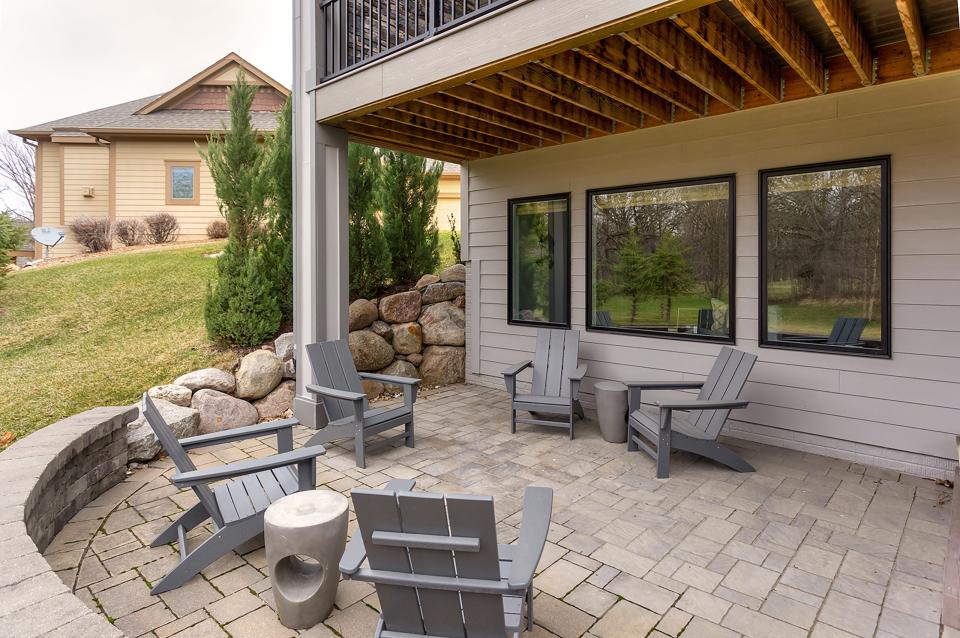 This $1,975,000 Urbandale home includes heated floors, a steam shower and four fireplaces. The home includes this patio.