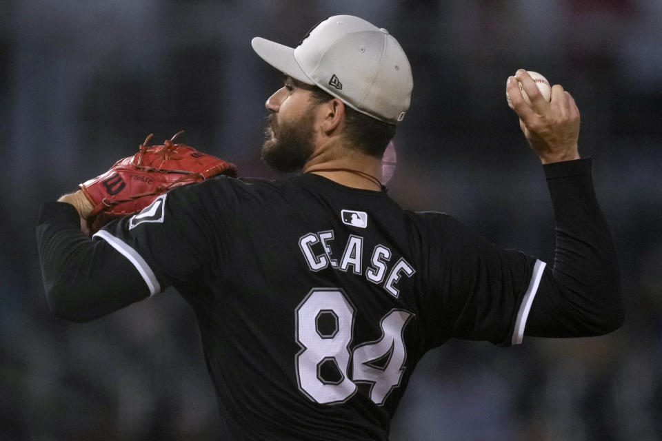 Chicago White Sox starting pitcher Dylan Cease throws to a Cincinnati Reds batter during the second inning of a spring training baseball game Tuesday, March 12, 2024, in Goodyear, Ariz. (AP Photo/Carolyn Kaster)