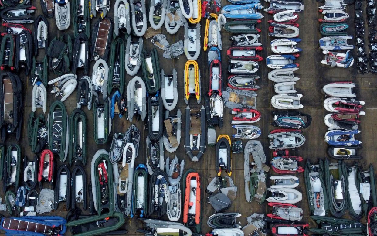 A view of one of two areas now being used at a warehouse facility in Dover, Kent, for boats used after being intercepted in the Channel - Gareth Fuller/PA