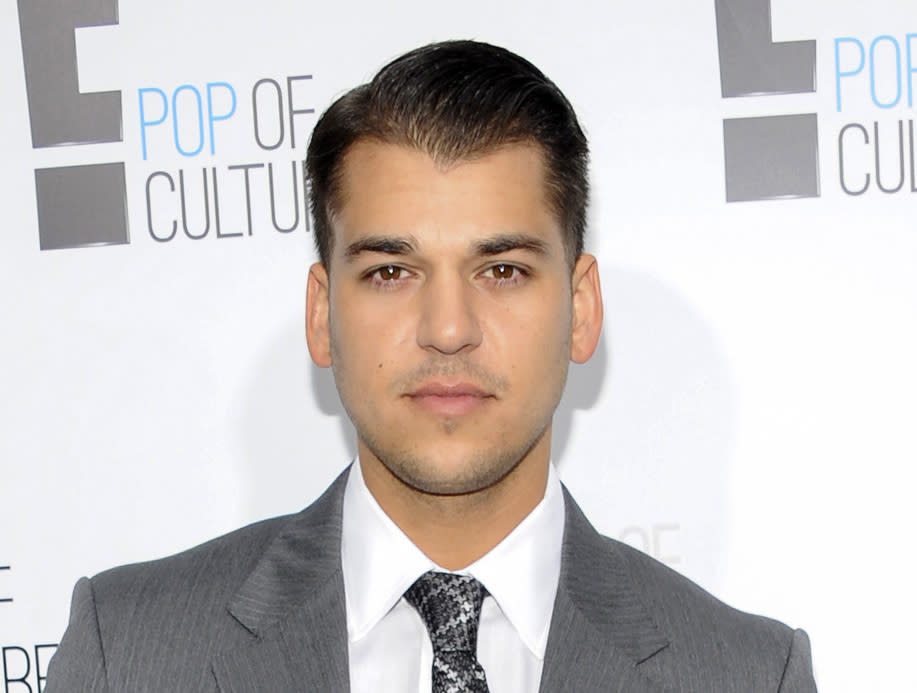 FILE - In this April 30, 2012 file photo, Rob Kardashian from the show "Keeping Up With The Kardashians" attends an E! Network upfront event in New York. Rob Kardashian says in an Instagram post Saturday, Dec. 17, 2016 that fiancee Blac Chyna has left him and taken their month-old daughter with her. (AP Photo/Evan Agostini, File)