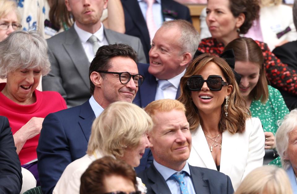 Hugh Jackman is seen next to Kate Beckinsale in the Royal Box during day thirteen of The Championships Wimbledon 2024 at All England Lawn Tennis and Croquet Club on July 13, 2024 in London.