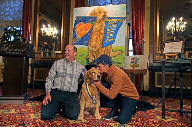 <p>David L. Ryan/The Boston Globe via Getty</p> There's also a portrait of Spencer at the headquarters for Boston Marathon activity.